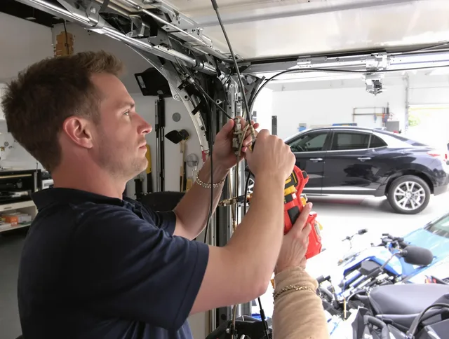 Euclid Garage Door Repair safety certified technician performing cable replacement in Euclid