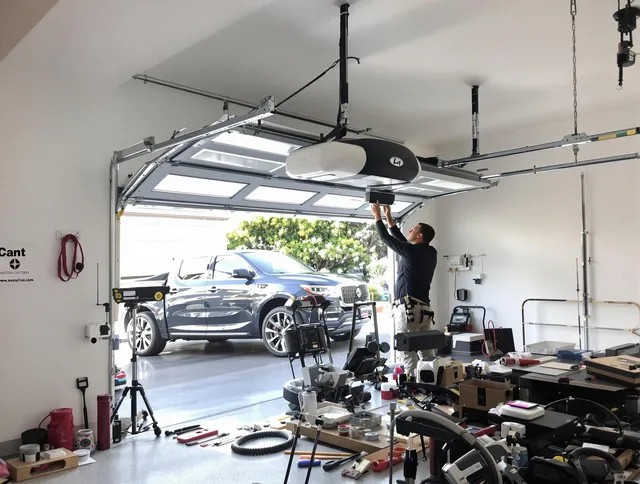 Euclid Garage Door Repair specialist installing smart garage door opener system in Euclid home